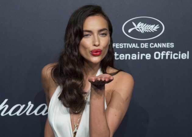 Model Irina Shayk poses during a photocall ahead of the Chopard Gold Party during the 68th Cannes Film Festival in Cannes, southern France, May 18, 2015. Irina Shayk