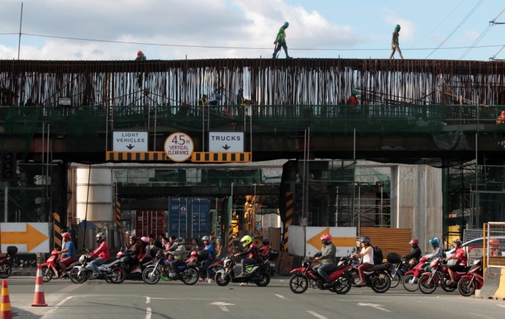 Labourers work at a construction site of a new expressway in Manila, Philippines Philippines construction