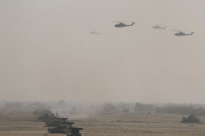 Pakistani armoured divisions conduct drills with close-air support from attack choppers. Pakistani military drills near India border
