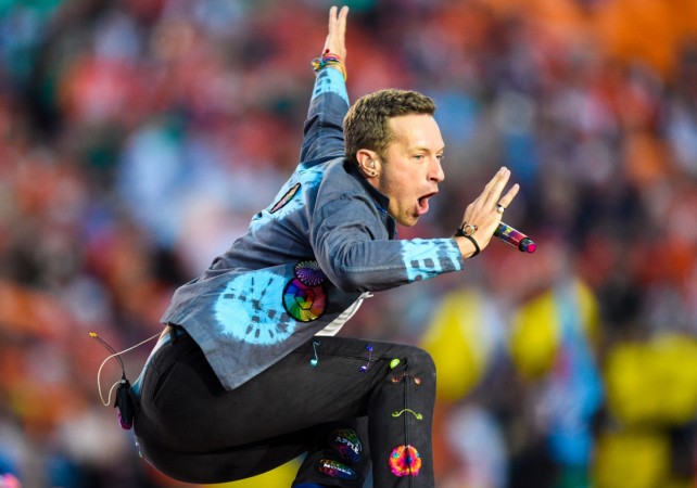 Recording artist Chris Martin of Coldplay performs during halftime between the Carolina Panthers and the Denver Broncos in Super Bowl 50 at Levi's Stadium. Chris Martin
