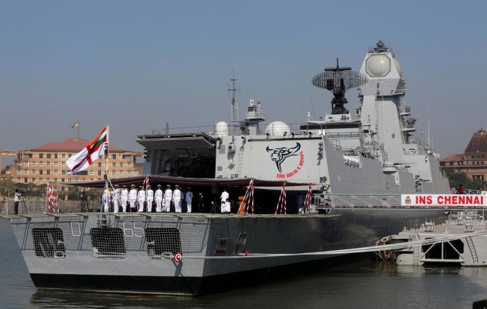 Indian Navy officers hoist the ensign aboard the INS Chennai, India's third indigenously designed guided missile destroyer during its commissioning ceremony in Mumbai, India, November 21, 2016. india defence army navy air force exports production manohar parrikar modi govt nda bjp brahmos vietnam china pakistan terrorism threat skies production companies licence industrial