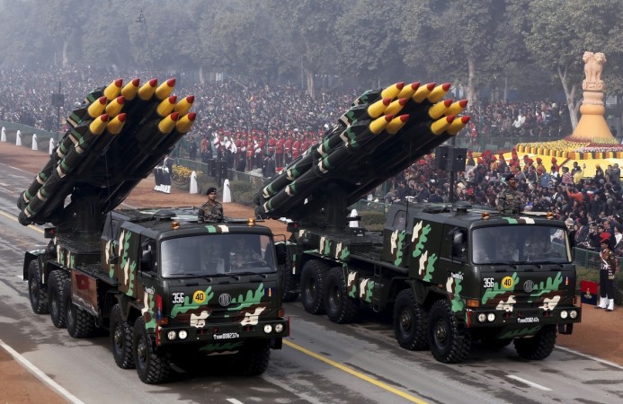 Indian army officers stand on vehicles displaying missiles during the Republic Day parade in New Delhi, India, January 26, 2016. [Representational picture) india defence army navy air force exports production manohar parrikar modi govt nda bjp brahmos vietnam china pakistan terrorism threat skies production companies licence industrial