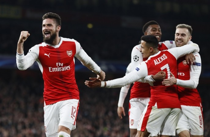 Arsenal players celebrate their second goal in the Champions League Group A match against PSG, November 23, 2016 Olivier Giroud Arsenal Sanchez Ramsey Iwobi