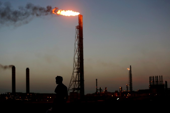 opec oil crude oil saudi arabia meeting november 30 output production cap india importer algeria iraq qatar russia non-opec cartel price brent nyse nymex venezuela libya iran
