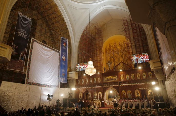 Egypt's main Coptic Church attacked Pictured: Egypt's Coptic Christians attend a Coptic Christmas eve mass led by Pope Tawadros II, the 118th Pope of the Coptic Orthodox Church of Alexandria and Patriarch of the See of St. Mark's Cathedral, in Cairo, Egypt, January 6, 2016. coptic church