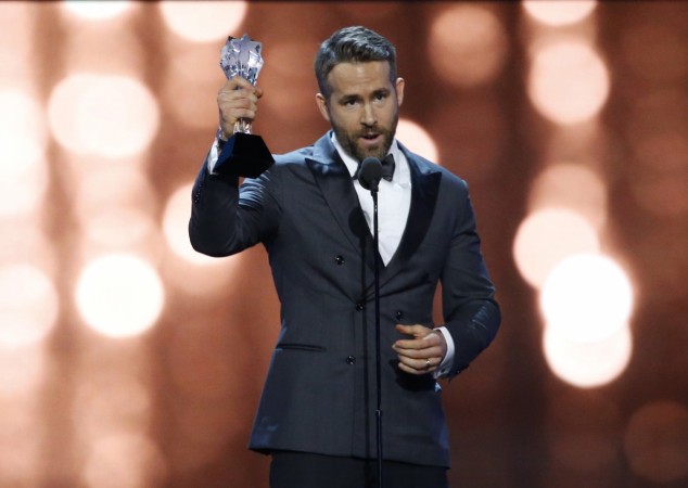 Ryan Reynolds holds his award for EW entertainer of the year at the 22nd Annual Critics' Choice Awards in Santa Monica, California, U.S., December 11, 2016. Ryan Reynolds
