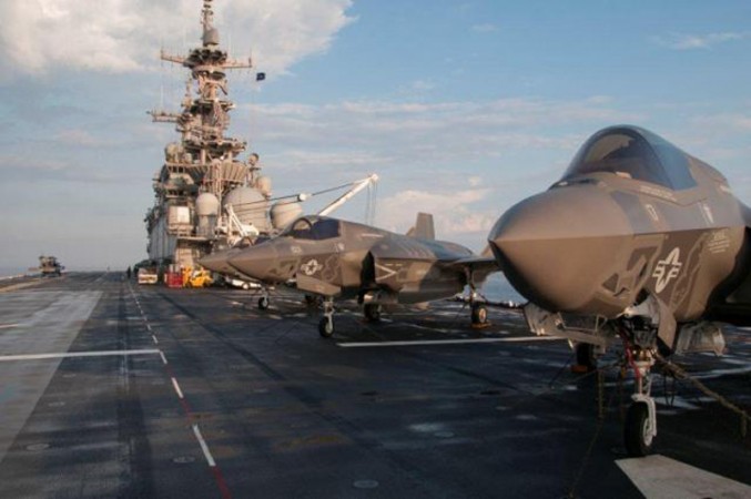 F-35 Bravo Lightning II stand ready on the deck of amphibious assault ship USS Wasp for day two of the first phase operational testing in the Atlantic Ocean in this handout photo taken May 19, 2015 F-35