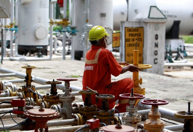 A technician works inside the Oil and Natural Gas Corp (ONGC) group gathering station on the outskirts of Ahmedabad, India, September 30, 2016. ongc bonus issue dividend bse sensex
