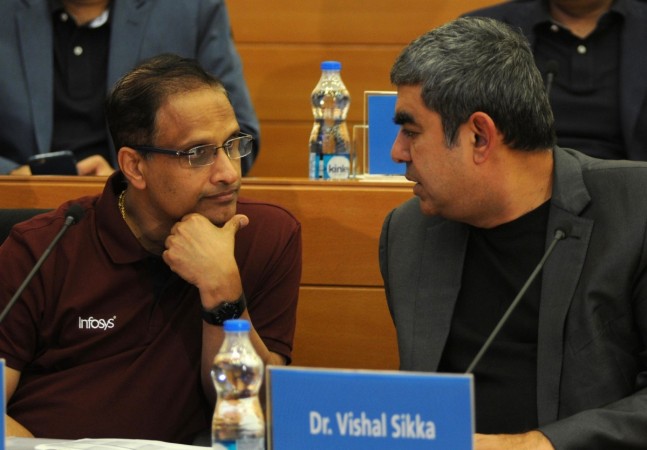 Infosys CEO Vishal Sikka and COO Pravin Rao during a press conference to announce the company's 2nd quarter financial results in Bengaluru on Oct 14, 2016. infosys hiring, infosys coo pravin rao, infosys to hire 20000, tcs to hire, tcs hiring, it layoffs, tcs share price, infosys share price, wipro share price