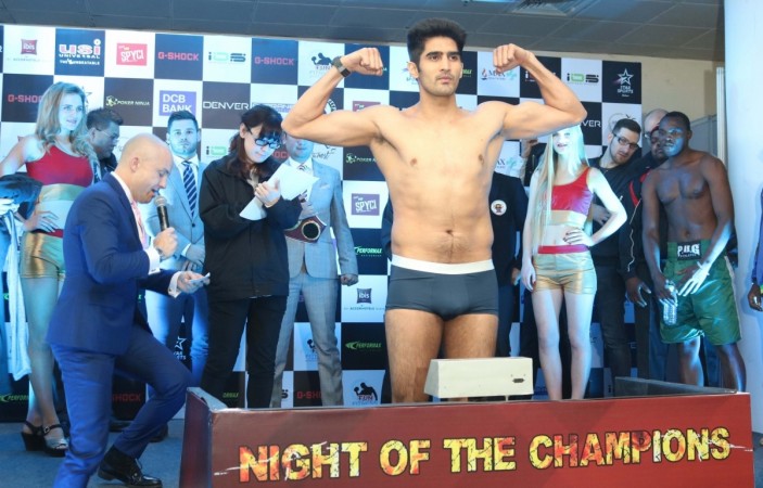 Indian boxer Vijender Singh along with Tanzania's Francis Cheka during a press conference ahead of vijender