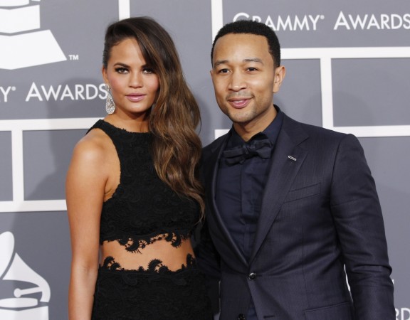 Singer-songwriter John Legend and his girlfriend model Chrissy Teigen arrive at the 55th annual Grammy Awards in Los Angeles, California Chrissy Teigen