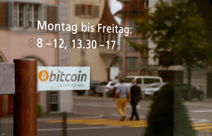 A sticker reading bitcoin, bitcoin trading, bitcoin value in 2017, bitcoin trading, bitcoin and demonetisation, bitcoin in india