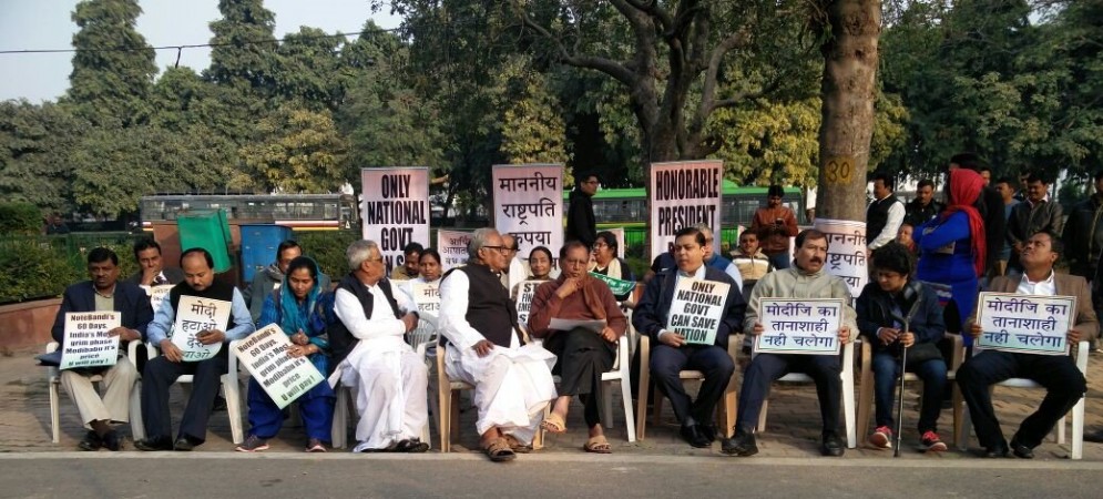 In picture: Trinamool Congress MPs sit in protest against demonetisation in New Delhi on Monday, January 9, 2017. Trinamool MPs