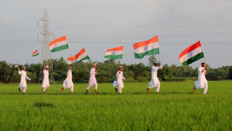 Children run holding the Indian flag. Republic Day, Republic Day songs, Republic Day, patriotic songs