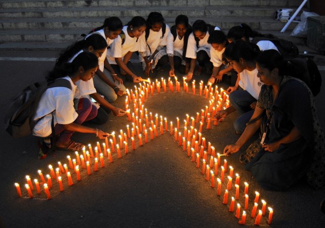 Staff members of a government-run pharmaceutical college promote cancer awareness and mark World Cancer Day in Bengaluru, India World Cancer Day 2017, cancer, health, India