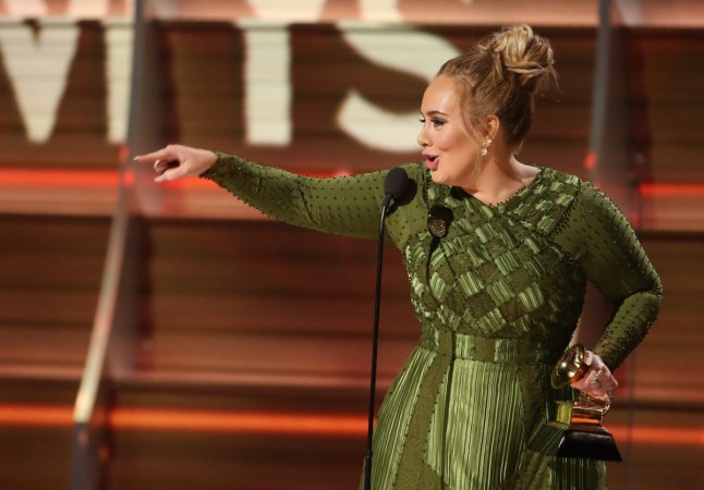 Adele accepts the Grammy for Record of the Year for Adele Grammys 2017