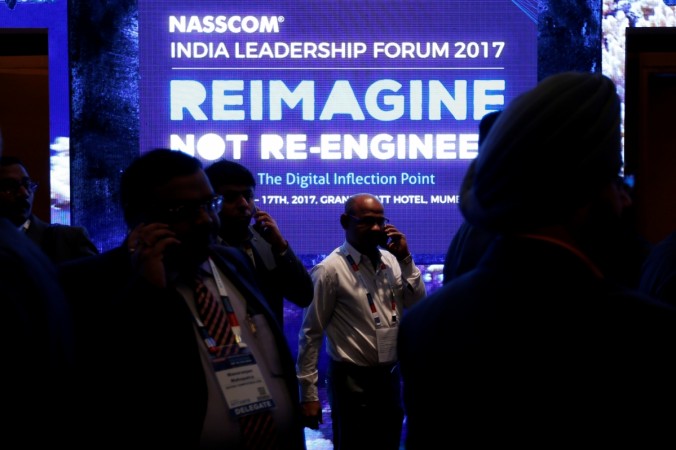 Delegates attend the National Association of Software and Services Companies (NASSCOM) India Leadership Forum in Mumbai, India February 16, 2017. nasscom summit, nasscom fy2018 projection, nasscom india leadership forum, indian it companies, h1 b visa rules, infosys, tcs, wipro