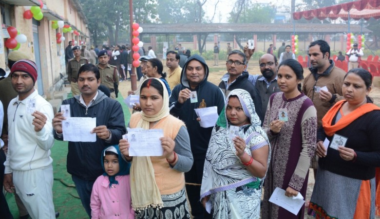 People queue up to cast their votes during the third phase of Uttar Pradesh Assembly polls in Lucknow on Feb 19, 2017. uttar pradesh assembly election 2017, up election phase 6, up election phase 7, bjp vs sp alliance, pm modi, akhilesh yadav, muslim voters