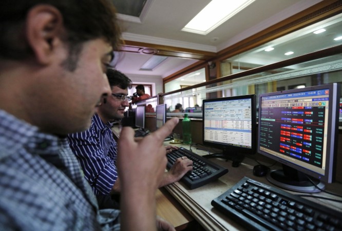 Brokers trade at their computer terminals at a stock brokerage firm in Mumbai January 6, 2015 (representational image). ril share price, lvb share price, bombay dyeing share price, icici prudential life share price, stocks at 52 week high