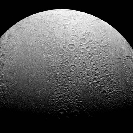 Enceladus is a frozen moon of Saturn which is believed to harbour life beneath its ice sheets Saturn's moon Enceladus