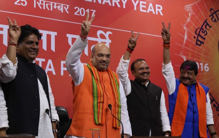 BJP chief Amit Shah addresses a press conference regarding party's performance in the assembly elections in New Delhi on March 11, 2017 uttar pradesh election results 2017, bjp president amit shah, pm modi, bjp wins uttar pradesh, bjp muslim candidates, politics of appeasement