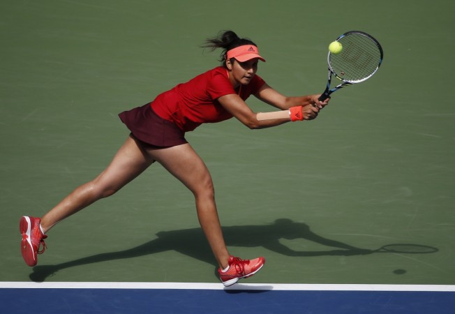 Sania Mirza condemned the advertisements on twitter Sania Mirza of India chases down a return with playing partner Martina Hingis of Switzerland (not pictured) as they face Casey Dellacqua of Australia and Yaroslava Shvedova of Kazakhstan in the women's doubles final match at the U.S. Open Championships te