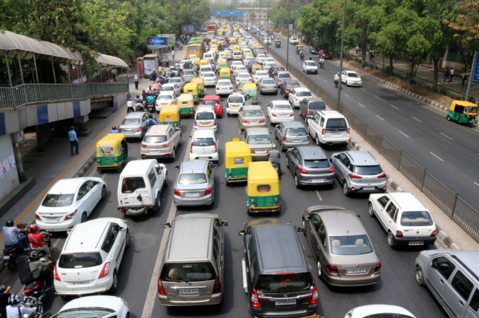 A view of Delhi traffic on the fifth day of implementation of odd-even traffic scheme aimed at battling pollution in New Delhi on April 19, 2016. cars, car sales, domestic car sales, gst on cars, auto industry, traffic