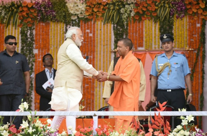 Prime Minister Narendra Modi and Uttar Pradesh Chief Minister Yogi Adityanath yogi adityanath swearing in, adityanath uttar pradesh chief minister