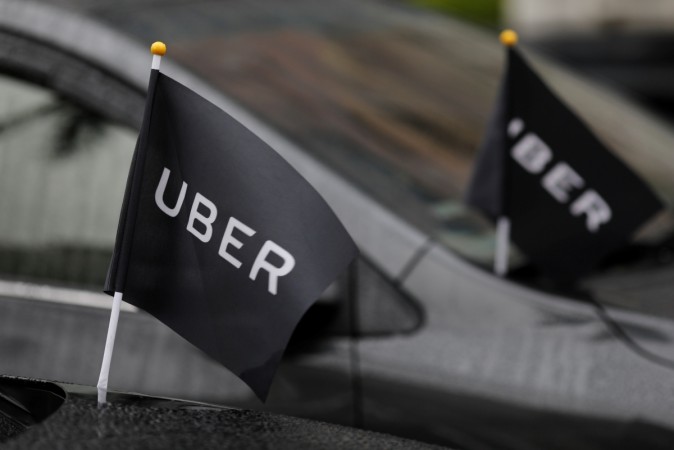 Uber drivers' cars are parked outside the Ministry of Transportation building during a protest in Taipei, Taiwan February 26, 2017. Uber