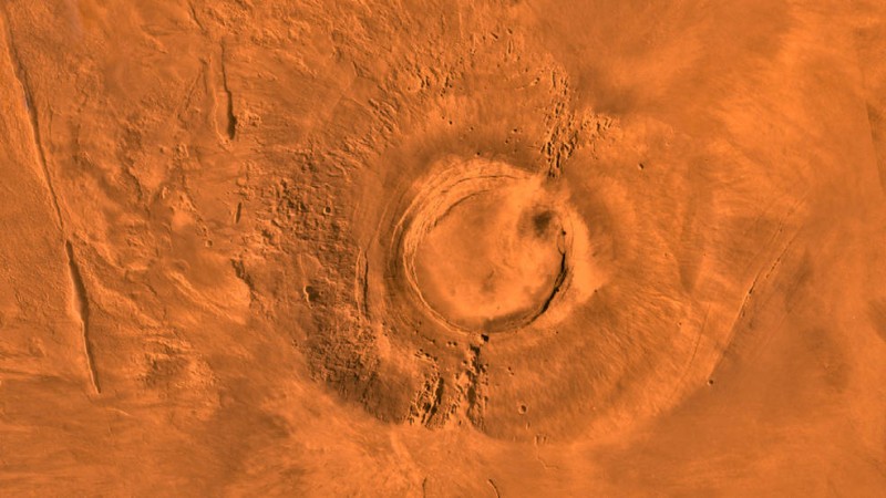 This digital-image mosaic of Mars' Tharsis plateau shows the extinct volcano Arsia Mons. It was assembled from images that the Viking 1 Orbiter took during its 1976-1980 working life at Mars. nasa, Mars, volcano, Mars exploration, Arsia Mons