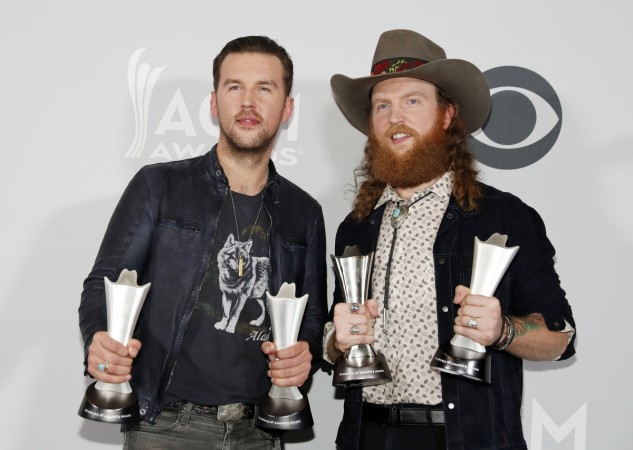 Brothers Osborne pose with their awards for Vocal Duo of the Year and New Vocal Duo/Group. Academy of Country Music Awards