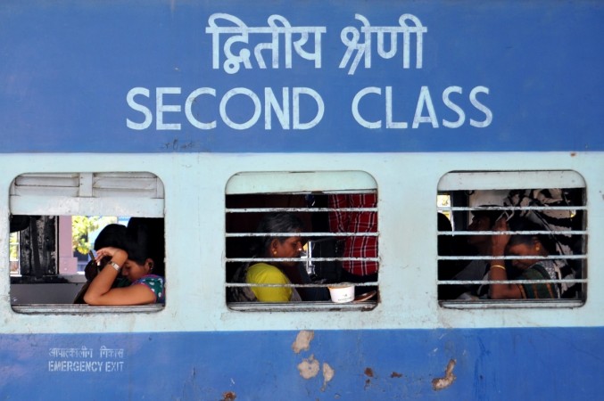 Passengers seated in a train at Bengaluru station on February 1, 2017. indian railways, indian train, bengaluru, bengaluru station, indian railways, suresh prabhu, train ticket, train accomodation