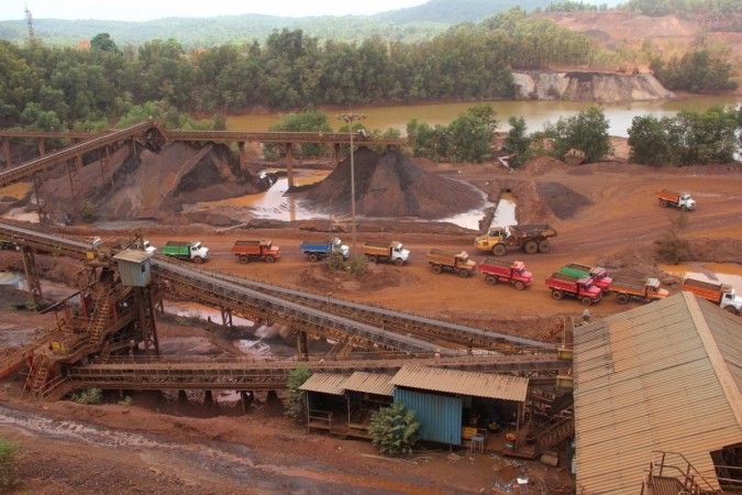 A view of iron ore mining at Kodli near Panaji on May 28, 2016. Mining of iron ore and bauxite, a multi-billion dollar industry in Goa and one of the main stays of the state economy was halted in 2012 following a series of bans first by the state government, central government and then by the Supreme Court of India, following the expose of a Rs.35,000 crore illegal mining scam in which all major mining companies, politicians and bureaucrats were linked. iron, steel, iron ore, metal stocks, commodities, mining, metal prices, tata steel, jsw, hindalco, arabian sea, india exports, trade data, india trade, indian economy, india imports