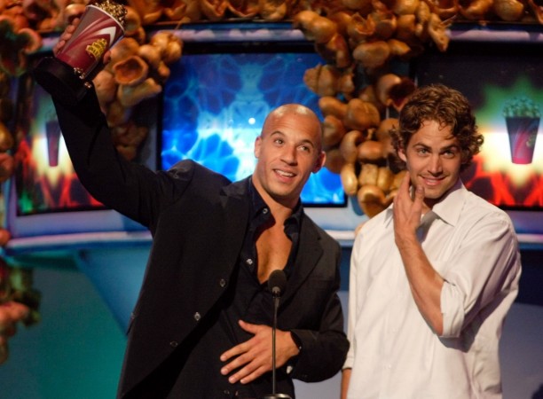 Actors Vin Diesel (L) and Paul Walker accept their award for Best On Screen Team for their roles in the film Actors Vin Diesel (L) and Paul Walker accept their award for Best On Screen Team
