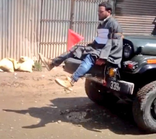 In picture: A screenshot from the video. Kashmiri man tied to Indian Army jeep