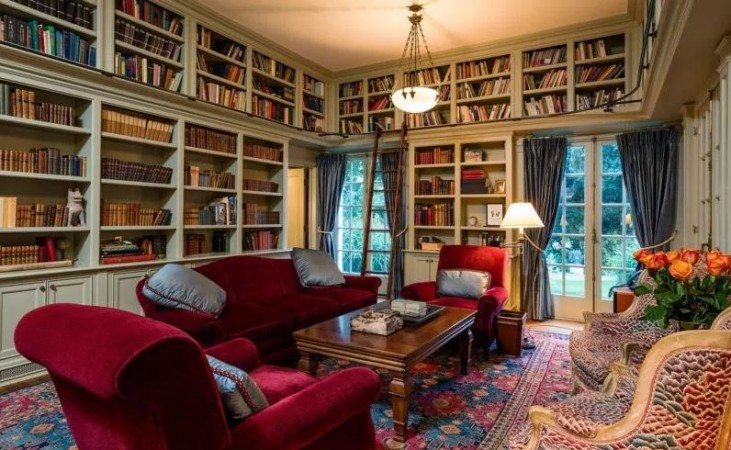The library with floor to ceiling shelves Angelina Jolie home