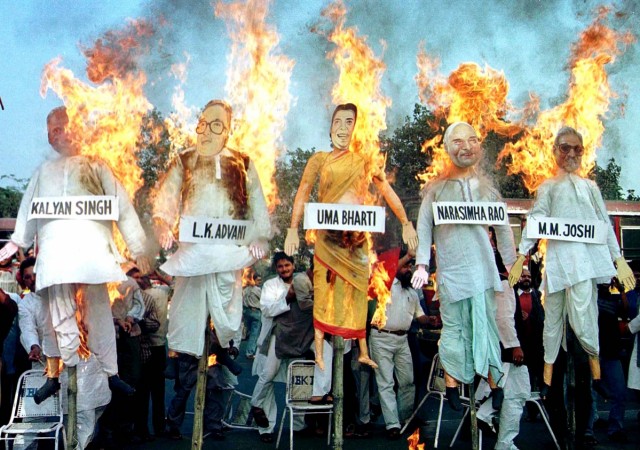 Activists of the regional Samajwadi Party burn effigies of leading Bharatiya Janata Party leaders in the eastern Indian city of Calcutta on December 6, 2000. Babri Masjid