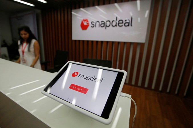 An employee is seen at the front desk of Snapdeal headquarters in Gurugram on the outskirts of New Delhi, India, April 3, 2017. snapdeal, snapdeal cofounders, snapdeal sale, snapdeal merger with flipkart, snapdeal binny bansal, snapdeal kunal bahl, softbank, snapdeal investors