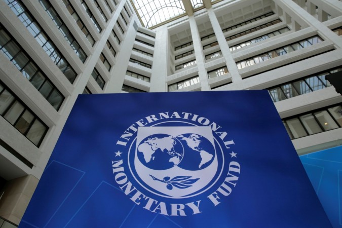 The International Monetary Fund logo is seen during the IMF/World Bank spring meetings in Washington, U.S., imf on india, imf report on india, india to overtake germany, india to surpass germany, india as 4th largest economy, imf on gst implementation, modi govt