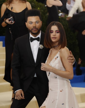 Selena Gomez and The Weeknd at Met Gala 2017. Selena Gomez and The Weeknd