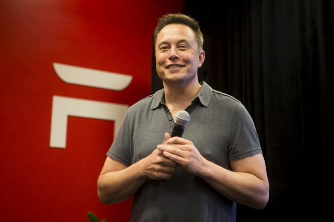 Tesla CEO Elon Musk speaks about new Autopilot features during a Tesla event in Palo Alto, California October 14, 2015. tesla share price, tesla market cap, tesla q1 results, tesla on nadaq, facebook share price, nasdaq companies, tesla ceo elon musk