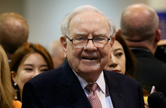 Berkshire Hathaway CEO Warren Buffett visits the BNSF booth before the Berkshire Hathaway annual meeting in Omaha, Nebraska, on May 6, 2017. Warren Buffett, Berkshire Hathaway, american companies, billionaires, forbes list, rich persons, us stock markets, wealth creators, wealthy individuals