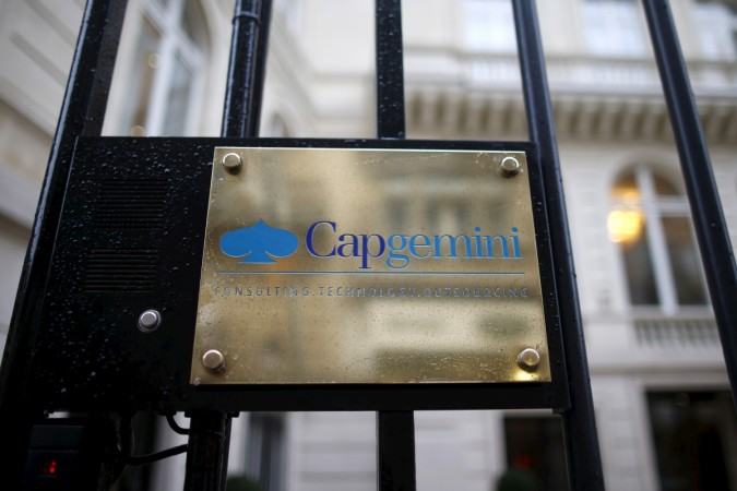 The logo of Capgemini is seen at the entrance of the company headquarters in Paris. Capgemini