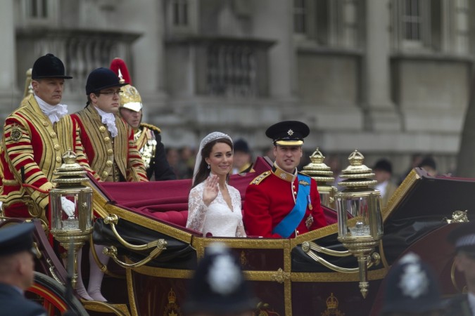 Duchess of Cambridge, and Prince William travel to Buckingham Palace in the 1902 State Landau along the Procession Route, after their wedding in Westminster Abbey, in central London April 29, 2011. Kate Middleton