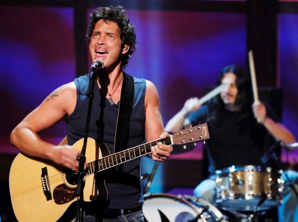 FILE PHOTO: Chris Cornell (L) and Brad Wilk of music group Audioslave perform live during the Chris Cornell