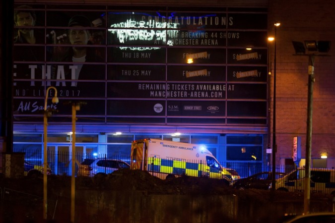 A police van and an ambulance are seen outside the Manchester Arena. Manchester Arena explosion