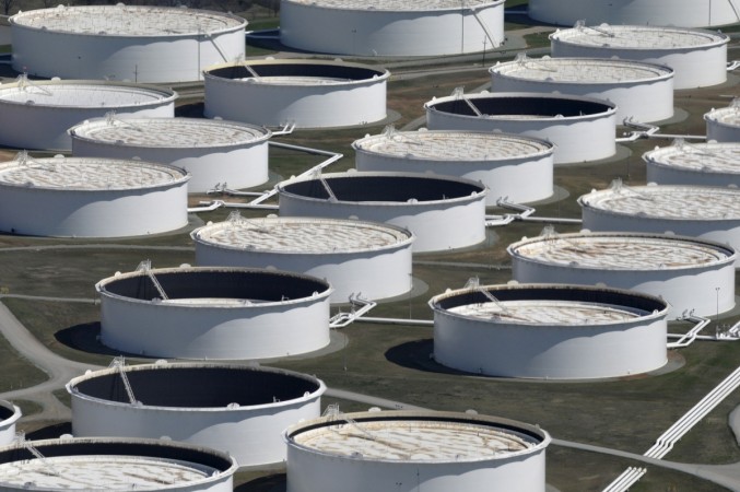 Crude oil storage tanks are seen from above at the Cushing oil hub, appearing to run out of space to contain a historic supply glut that has hammered prices, in Cushing, Oklahoma, March 24, 2016. crude oil prices, opec, us oil reserve, donald trump and crude oil, donald trump, saudi arabia