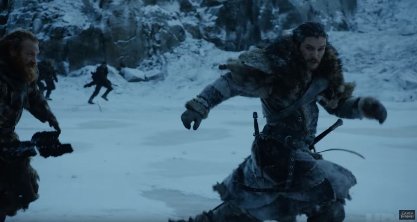 Jon Snow and Tormund running away (may be from White Walkers). Game of Thrones season 7