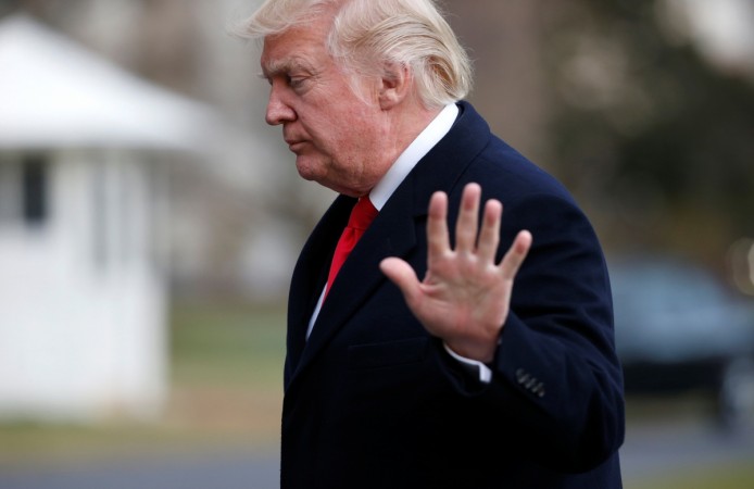U.S. President Donald Trump waves as he walks from Marine One upon his return to the White House in Washington, U.S., March 19, 2017. U.S. President Donald Trump