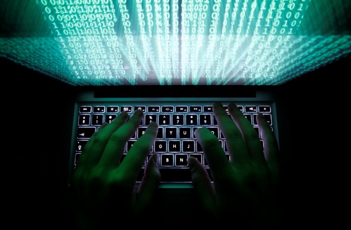 A man types on a computer keyboard in this illustration picture taken February 28, 2013. A man types on a computer keyboard in this illustration picture taken February 28, 2013